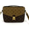 Front of the bag in Reverse Monogram canvas