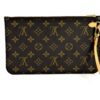 Front of the pouch with the vachetta wristlet attached