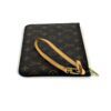 Angled view with the wristlet strap looped