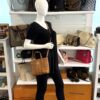 Mini Toni shopper carried by a mannequin in the boutique