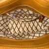 Interior zip pocket set into the monogram fabric lining