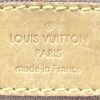 Leather tag reading LOUIS VUITTON PARIS made in France