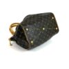 Base at an angle showing the protective gold studs