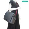 Bag shown on a dress form to show how it sits at the hip