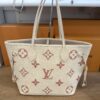 Front of the tote showing the rose giant monogram print