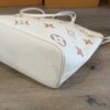 Base corner showing the seam and embossed leather