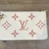 Matching pouch with the rose monogram and wristlet