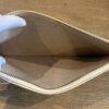 Pouch held open showing the interior lining