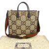 Tote shown with its Gucci dust bag
