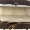 Interior D ring and zip against the canvas lining