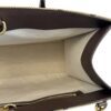 Interior zip pocket open inside the tote