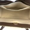 Interior zip pocket set into the canvas lining