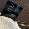 Interior Gucci tag showing the reference number