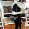 Mannequin carrying the Saddle bag on the shoulder