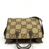 Front of the tote with both handles upright