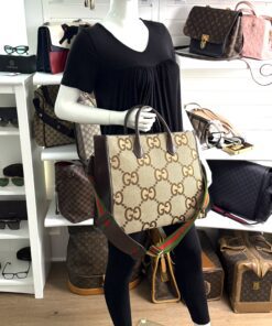 Jumbo GG tote carried by a mannequin in the boutique
