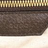 Interior leather patch and zip inside the tote