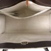 Interior open showing the lining and zip pocket