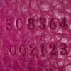 Serial numbers 308364 and 002123 embossed inside