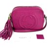 Soho Disco shown with its Gucci care card and leather tag