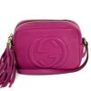 Gucci Soho Disco crossbody in hot pink pebbled leather with embossed GG and tassel
