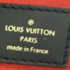 Leather tag reading LOUIS VUITTON PARIS made in France