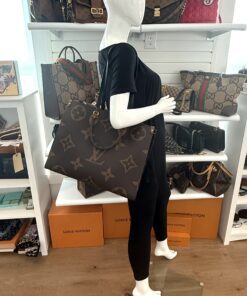 Onthego GM carried by a mannequin in the boutique