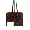 Tote shown with its certificate of authenticity card