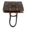 Brown side of the tote with the handles standing