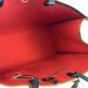 Interior held open showing the full red lining
