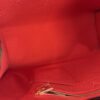 Detail of the red interior lining and zip