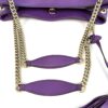 Chain straps with their purple leather shoulder pads