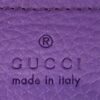 GUCCI made in Italy embossed into the purple leather