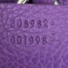 Serial numbers 308982 and 001998 embossed inside