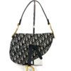 Front of the Saddle bag with the gold D charm hanging