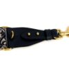 Strap end with the gold clip and adjuster