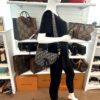 Saddle bag worn on the shoulder by a mannequin