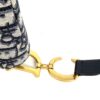 Gold CD hardware where the strap meets the bag
