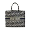 Dior Book Tote in blue Dior Oblique embroidery on ecru with the CHRISTIAN DIOR band