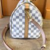 Opposite end with the strap attached and the zip pull hanging