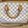 Front of the Speedy 30 with the handles laid forward over the zip