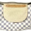 Interior slip pocket set into the pale canvas lining