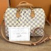 Speedy 30 shown with its certificate of authenticity, lock and clochette