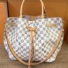 Louis Vuitton Girolata hobo in Damier Azur canvas with vachetta leather handles and trim