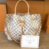 Bag shown with its certificate of authenticity card