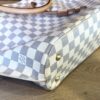 Base corner showing the canvas and leather trim