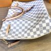 Base of the bag with the strap laid across