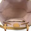 LOUIS VUITTON embossed on the rose interior lining