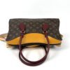 Back of the satchel with the handles down