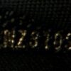 Date code stamped inside the pochette